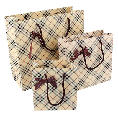 Купить Таможня напечатала Biodegradable бумажные сумки оптовые с Bowknot online manufacture